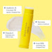  Lip balm in a tube showcasing a distinctive yellow and white design.