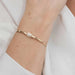 Pearl of My Heart 5.5-inch bracelet with sterling silver, 14K gold artist wire wraps, and a genuine white freshwater pearl.