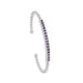 This rhodium-finished cuff features a striking pave bar detail that catches the light beautifully