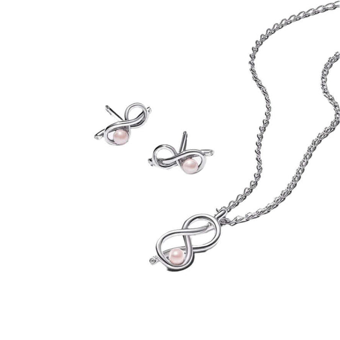 Jewelry set with necklace and earrings featuring pink pearl on a white background