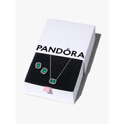 Elegant Pandora emerald necklace set featuring a stunning emerald pendant and matching earrings on a soft background.