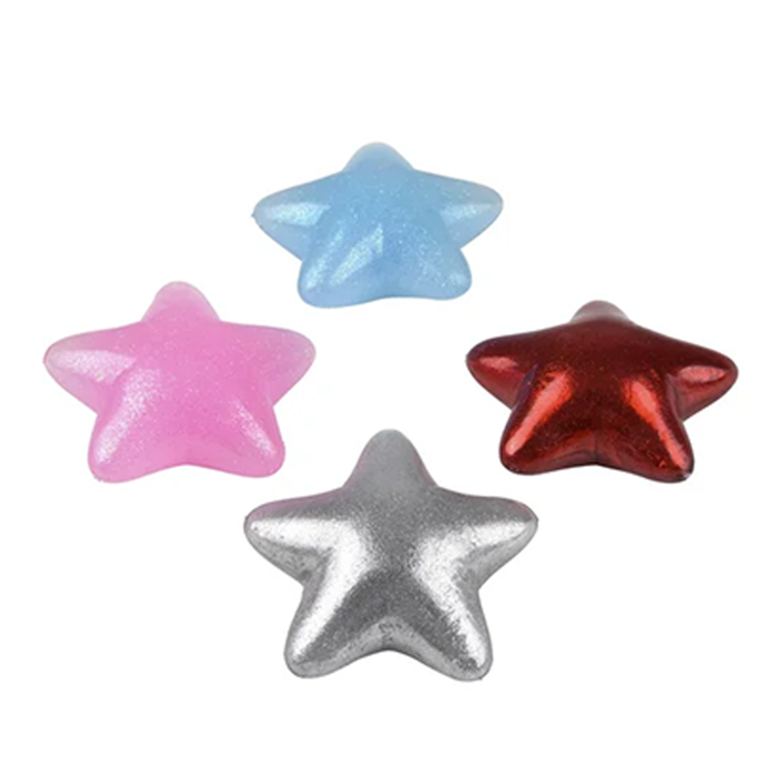 Four star-shaped candies in pink, blue, silver, and red on a white background