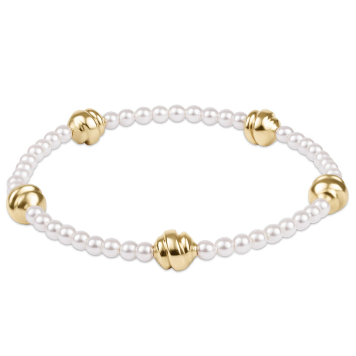 Admire Small Gold 3mm Pearl Bracelet with crystal pearls and small gold beads on a white background