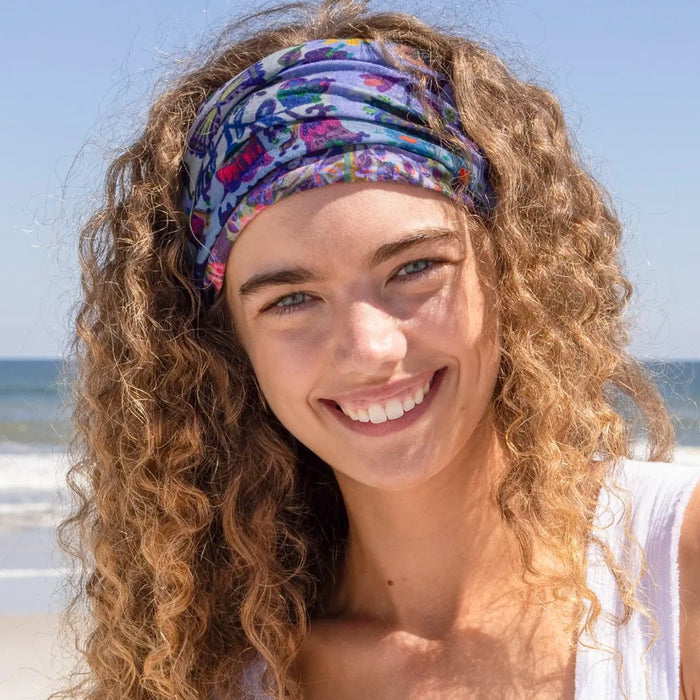This headband features a cotton blend fabric, providing a soft and stylish accessory option.