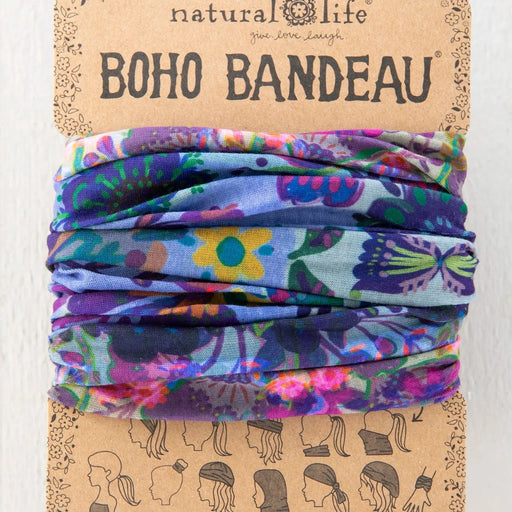 A colorful boho bandana made from a variety of vibrant fabrics, showcasing a mix of patterns and textures.