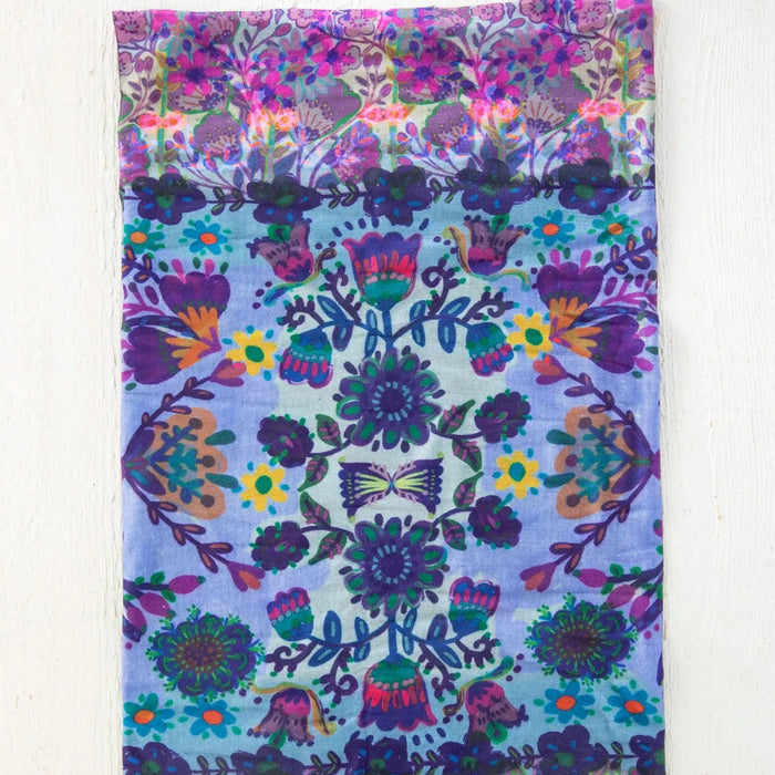 A boho bandana featuring an array of colorful fabrics, highlighting diverse patterns and a vibrant design.
