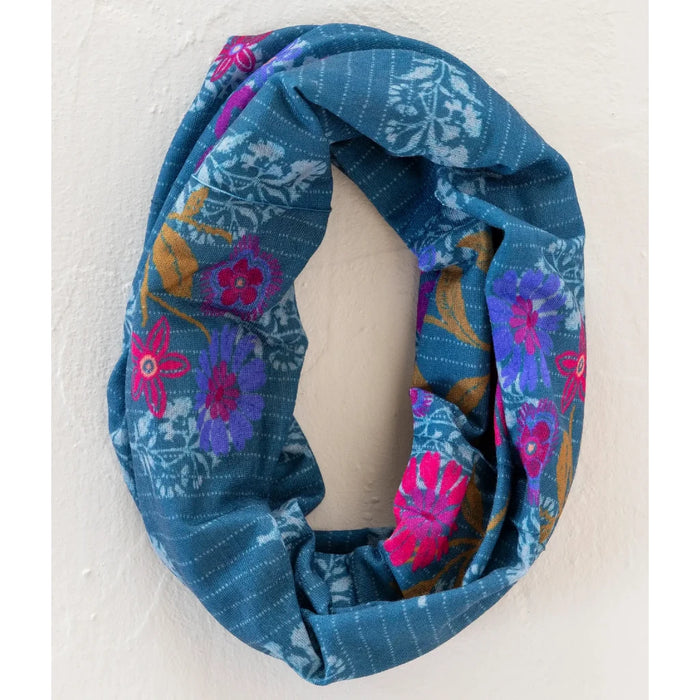 Stylish boho bandeau neck scarf made of blue and pink floral fabric, suitable for various fashion ensembles.