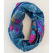 Stylish boho bandeau neck scarf made of blue and pink floral fabric, suitable for various fashion ensembles.