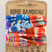 The boho bandeau features a lively, colorful fabric with an eclectic mix of patterns and shades.