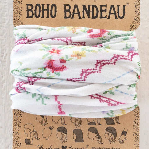Boho bandeau made of cotton featuring a vibrant floral design, perfect for adding a stylish touch to any outfit.