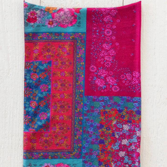 A vibrant pink boho bandana featuring unique designs, ideal for fashion-forward accessories.