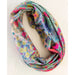 A vibrant boho bandeau crafted from colorful fabric, displaying a mix of eye-catching patterns.