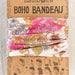 A boho-style bandana featuring a natural life design with earthy colors and intricate patterns.