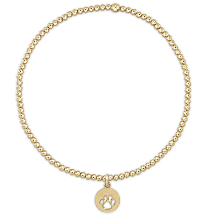 Crafted with a strand of polished gold-tone beads, this bracelet offers a timeless and elegant look