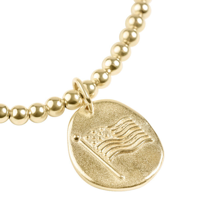 "Perfect for gifting or personal collection building, the Enewton Classic Gold America Disc Bracelet represents quality craftsmanship and timeless design"