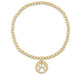 "Hand beaded on high performance elastic for a slight stretch to easily roll on and off your wrist"