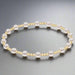Perfect for gift-giving or personal collection building, this classic gold bead bracelet transitions seamlessly from casual to elegant occasions.