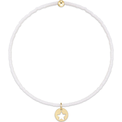 "Hand-beaded on high-performance elastic, this bracelet stretches gently for effortless on-and-off wear without compromising durability."