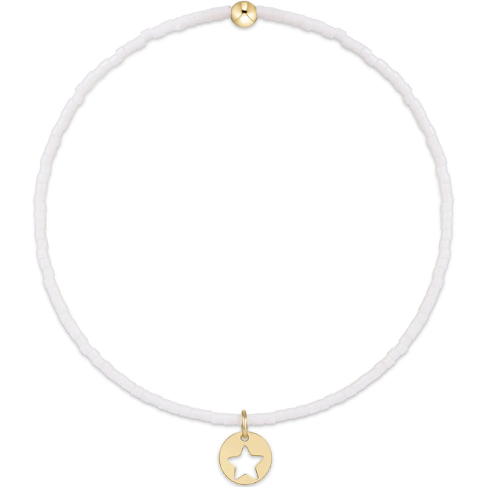 "Hand-beaded on high-performance elastic, this bracelet stretches gently for effortless on-and-off wear without compromising durability."