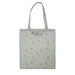 A green tote bag featuring a design of colorful birds and flowers.