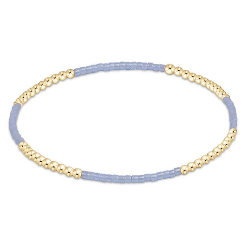 "Its lightweight stretch design ensures a comfortable fit, making it easy to wear alone or stacked with your favorite bracelets for a layered look."