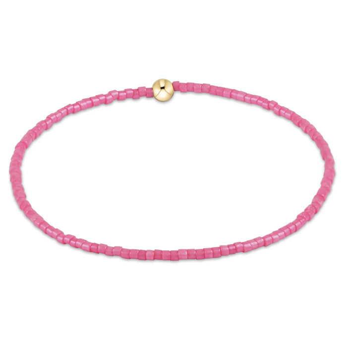 Hand beaded on high performance elastic for a slight stretch to easily roll on and off your wrist