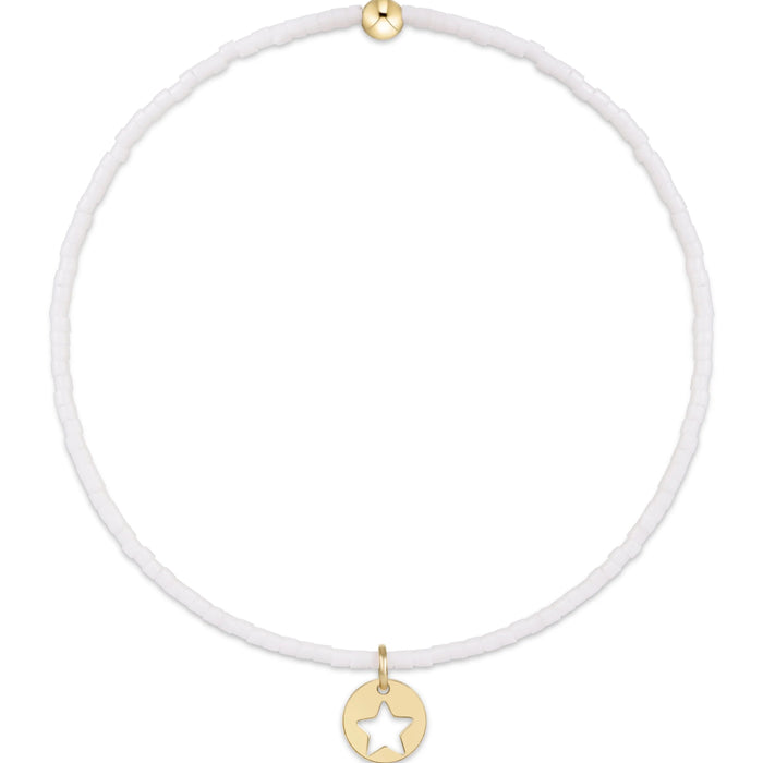 "The durable construction ensures lasting beauty through daily adventures. Stack this classic piece with other bracelets to create your signature look"