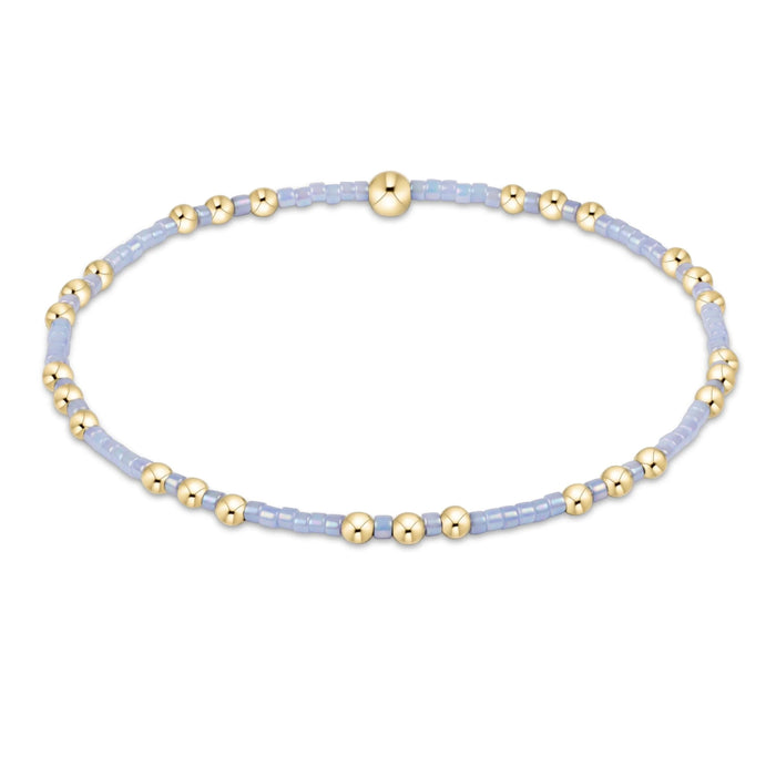 "Its lightweight stretch design ensures a comfortable fit, making it easy to wear alone or stacked with your favorite bracelets for a layered look"