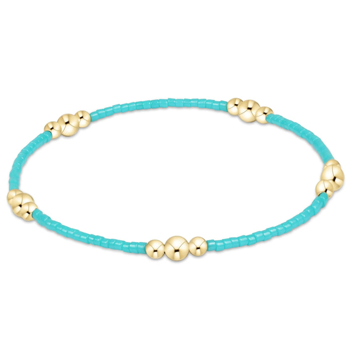 "Made with 2mm seed beads and 3mm and 4mm, 14kt gold-filled beads"
