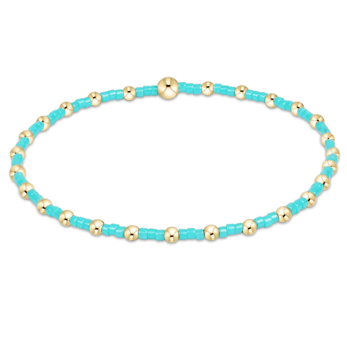 "Its lightweight stretch design ensures a comfortable fit, making it easy to wear alone or stacked with your favorite bracelets for a layered look."
