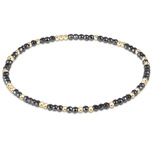 enewton design Hope Unwritten bracelet with faceted hematite beads and gold-filled accent beads.