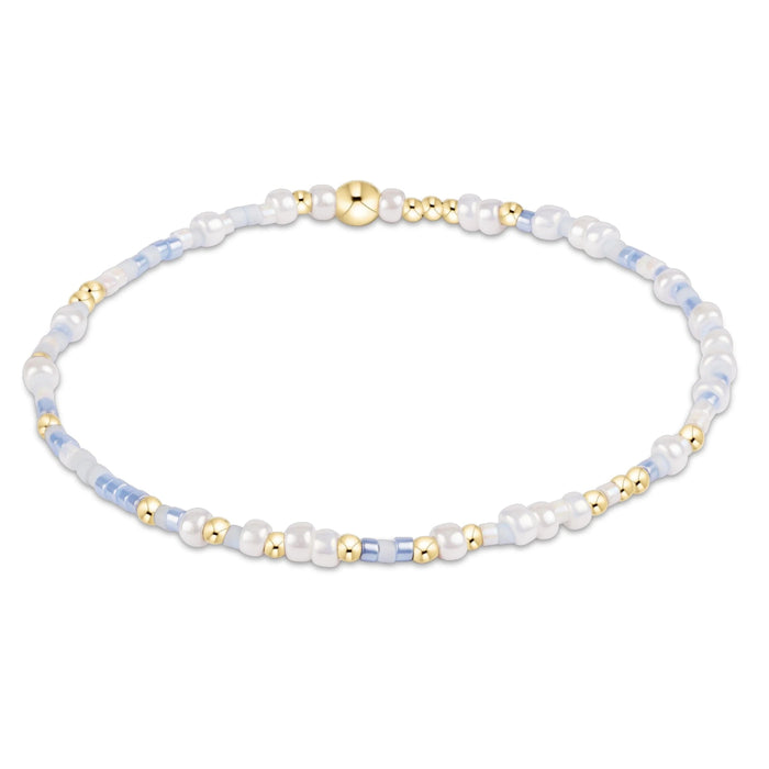 Made with various colors of randomly mixed 2mm seed beads and 2mm 14k gold-filled beads