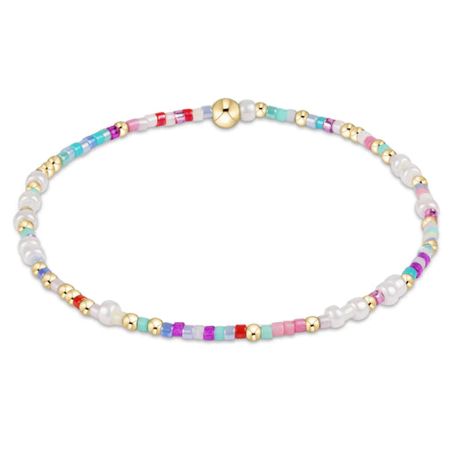"Made with various colors of randomly mixed 2mm seed beads and 2mm 14k gold-filled beads"
