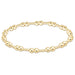 Gold‑filled beaded bracelet with 2mm and 4mm beads on elastic, available in two sizes