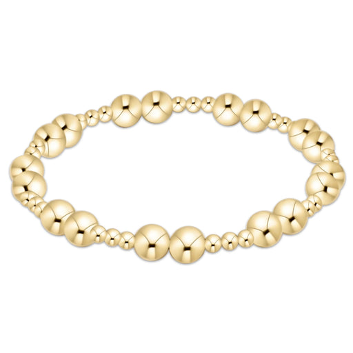 Gold‑filled beaded bracelet with 3mm and 6mm beads on elastic, available in standard and extended sizes.
