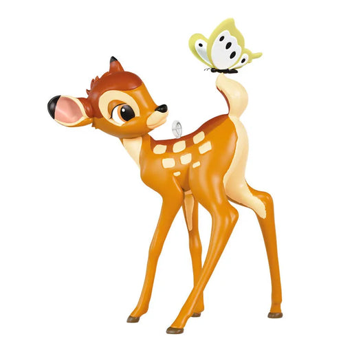 Glossy plastic Bambi figurine ornament with yellow-green butterfly perched on curled tail