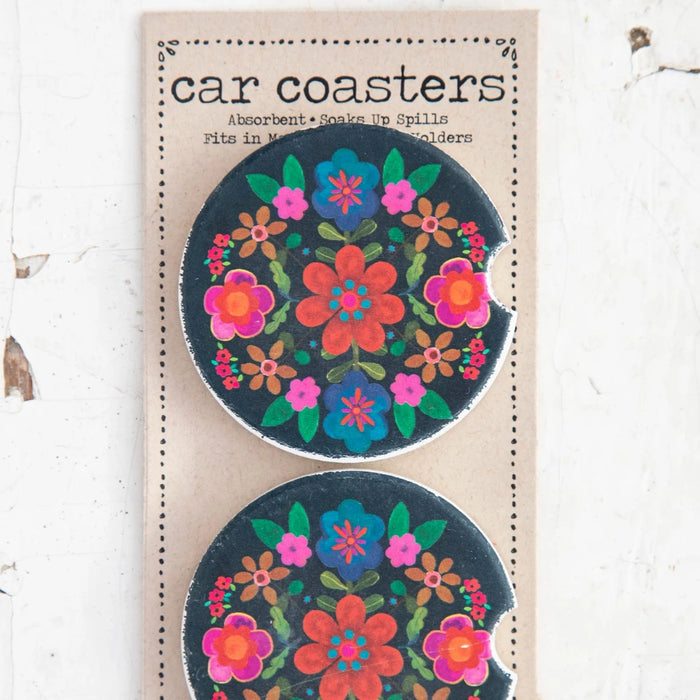 Two car magnets featuring vibrant floral designs in various colors and patterns.