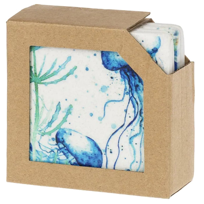Set of coasters with a blue and green abstract design in a brown cardboard box.