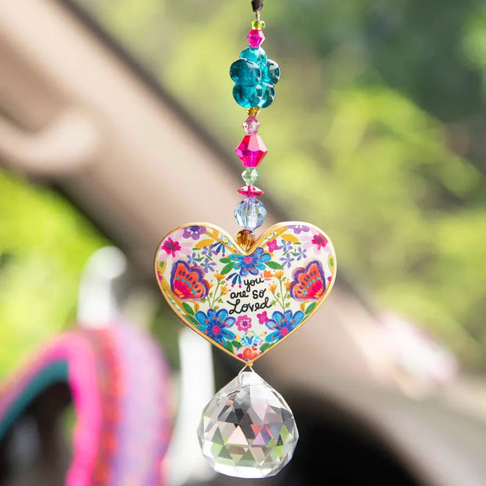 Heart-shaped You Are So Loved sun catcher car charm for inspirational vehicle décor.