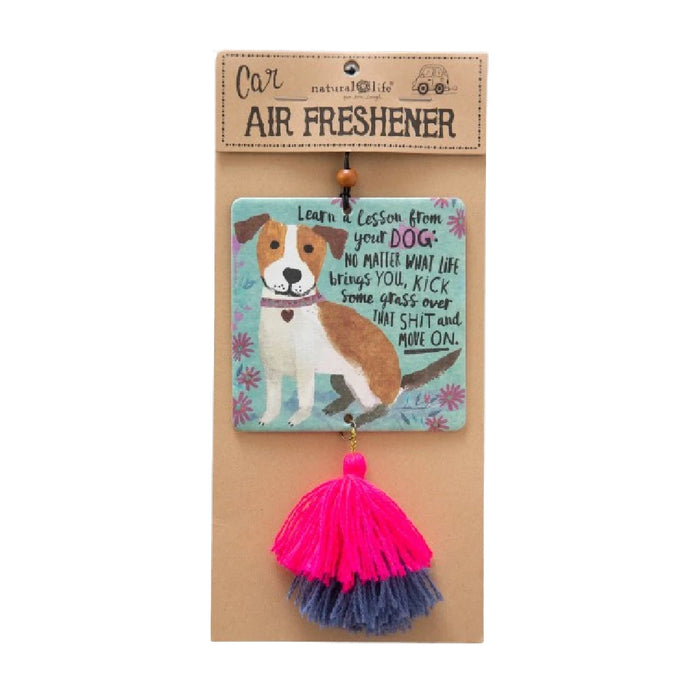Air freshener featuring a dog design and a decorative tassel attached to its cap.