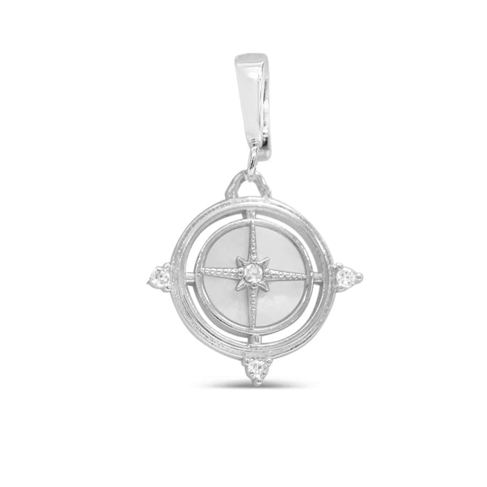 A silver compass pendant adorned with a white stone, showcasing a blend of elegance and navigational charm.