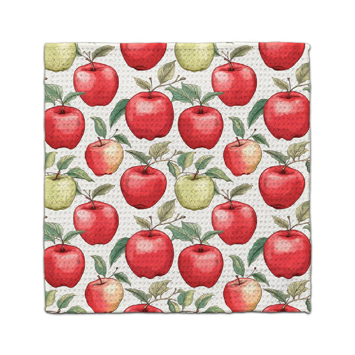 A white napkin adorned with a vibrant red apple pattern.
