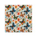 A striking pattern of multicolored butterflies on a white backdrop, showcasing intricate designs and vivid hues.