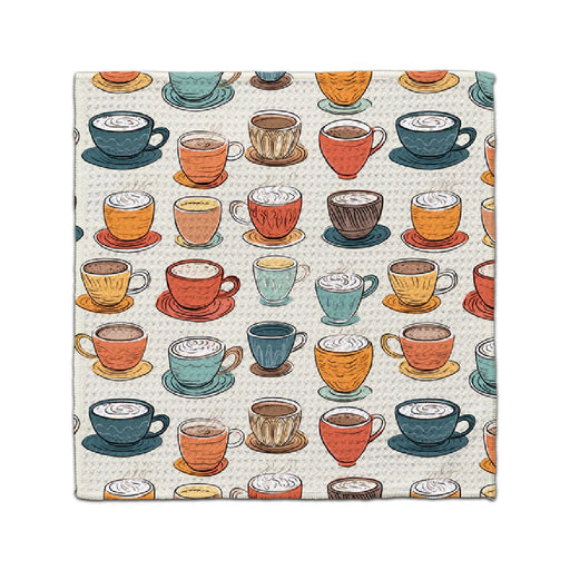 A decorative napkin adorned with a pattern of colorful coffee cups, arranged in a playful design.
