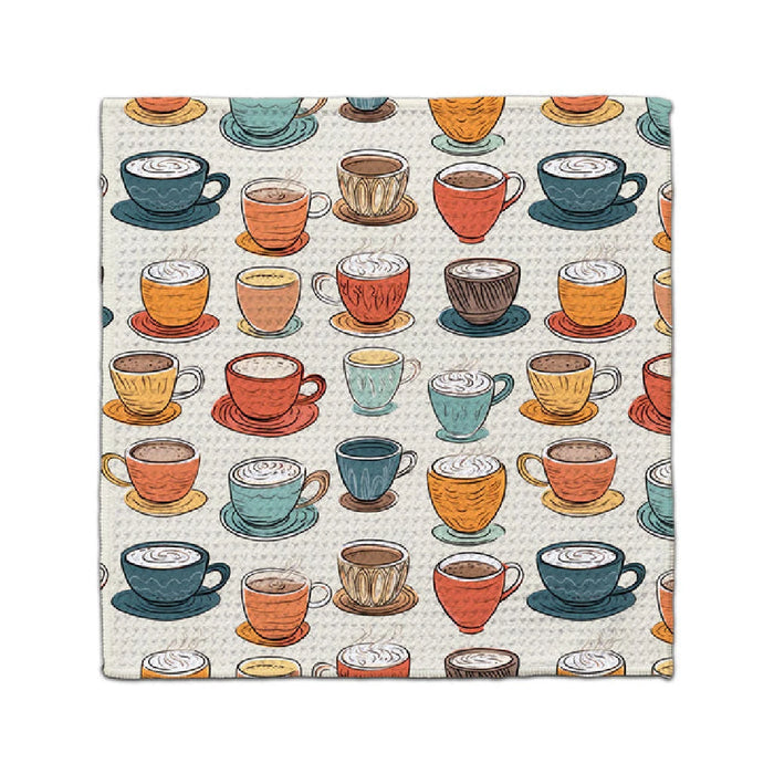 A decorative napkin adorned with a pattern of colorful coffee cups, arranged in a playful design.
