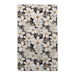 A white and gold floral pattern elegantly contrasts against a black background.