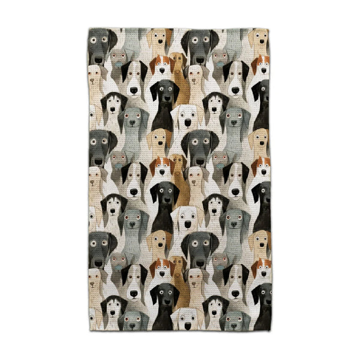 CJ Bella Puppy Power towel featuring a repeating pattern of illustrated dogs in black, gray, tan, brown, and white.