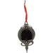 Decorative black metal ornament with a red ribbon on a white background