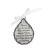 Teardrop-shaped ornament with engraved text on a white background