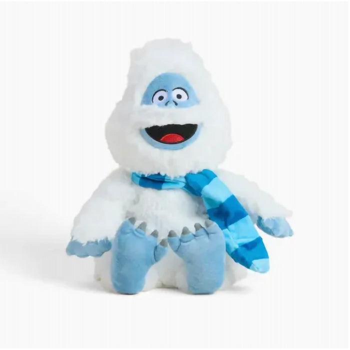 Plush toy resembling a snow creature with a blue scarf on a white background